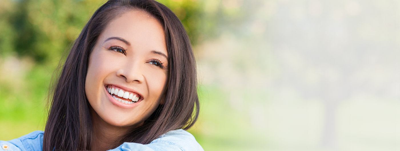 Young woman with straight teeth