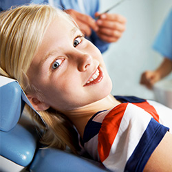 Young girl in orthodontic exam room