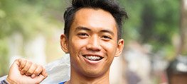 Young man with traditional braces