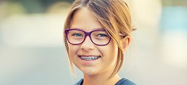 Preteen girl with braces